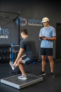  Patient working with a provider at a performance physical therapy clinic in Henrico